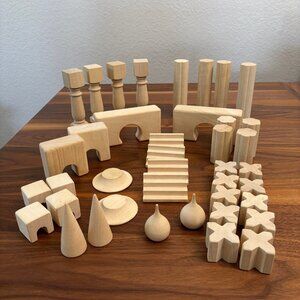 Unique wooden block set with stairs, columns, arches, and minarets.
